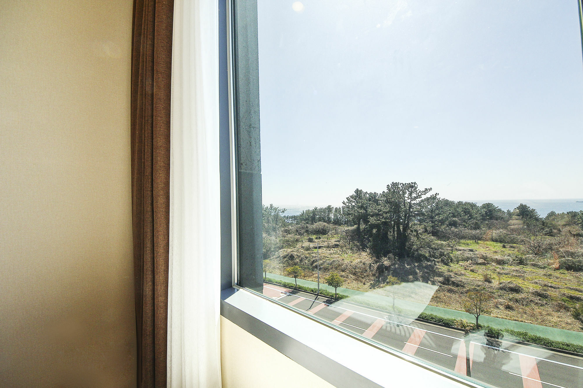 Jeju Jungmun Ocean Blue Hotel Сеогвипо Екстериор снимка